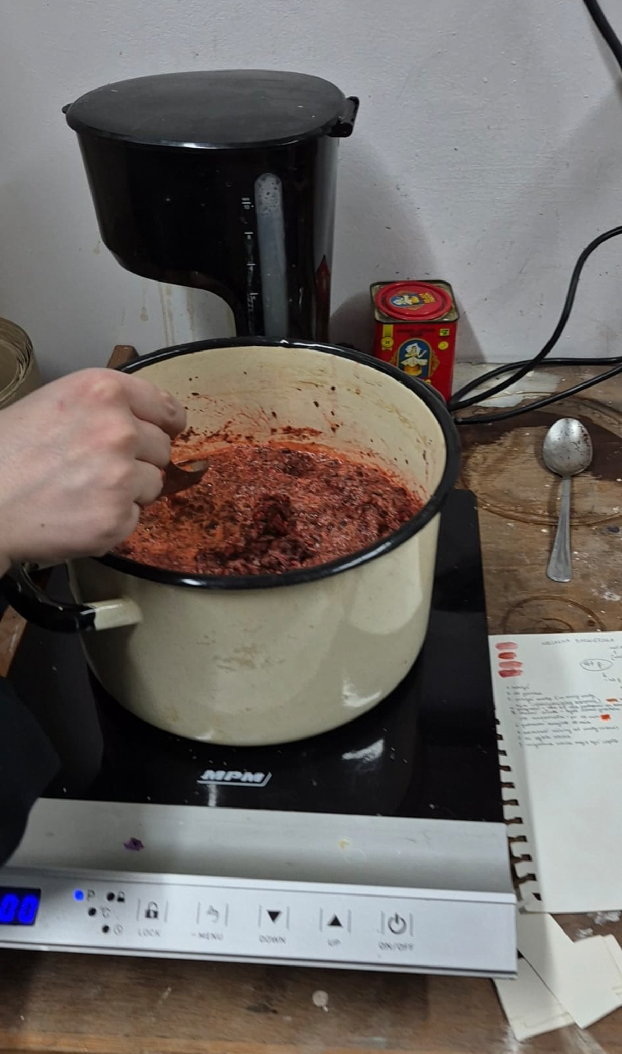 Plant material being heated during colour extraction