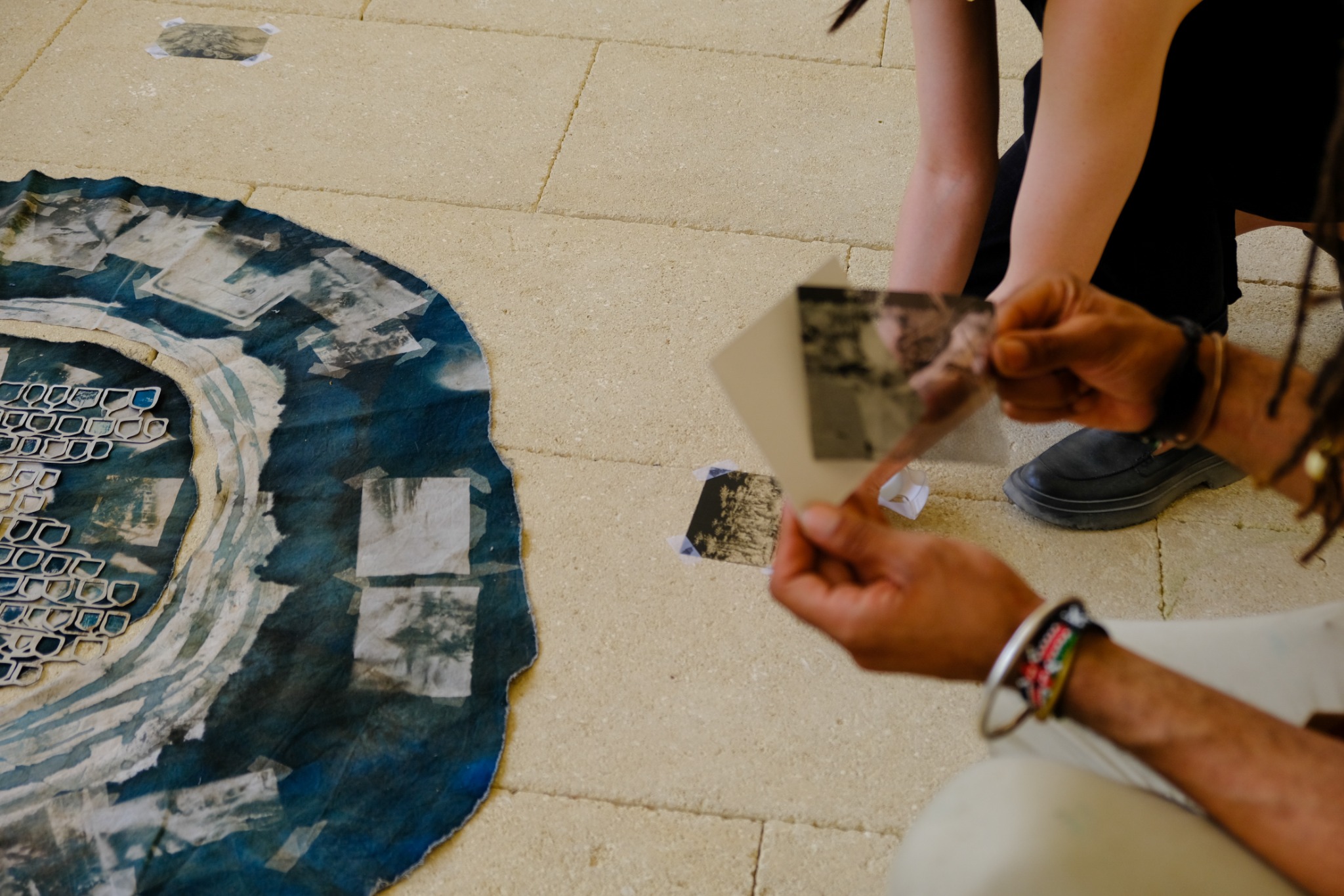 Participant engaging with cyanotype archive
